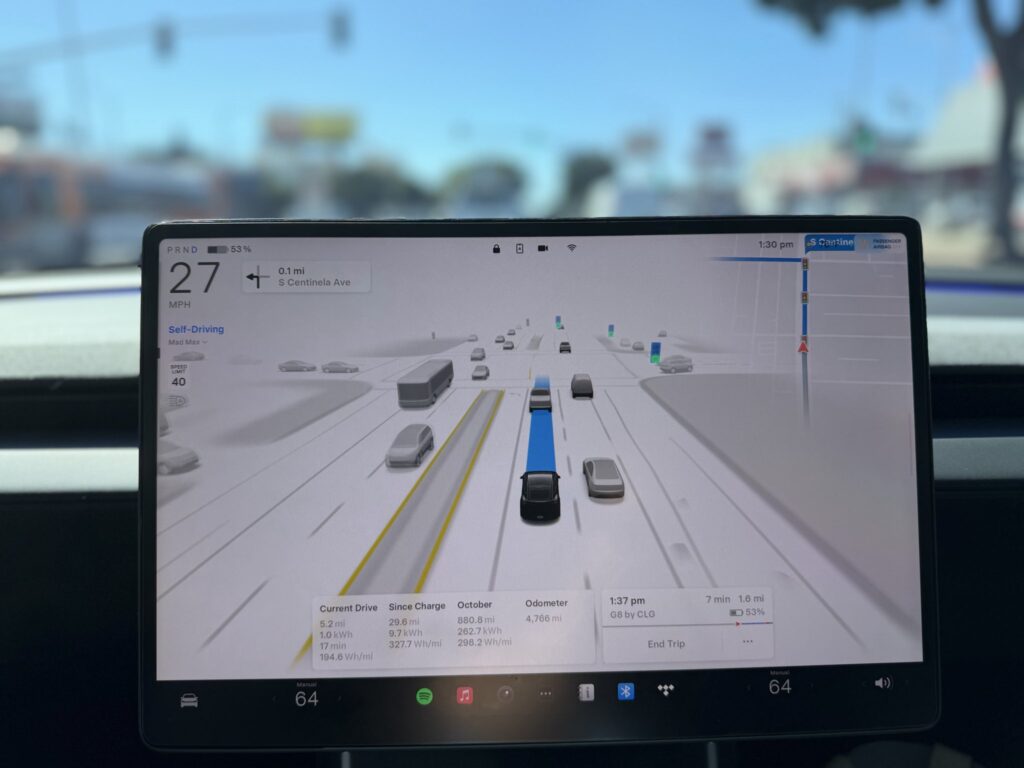 Tesla FSD 14 influencing buy Tesla stock 2025 decisions.